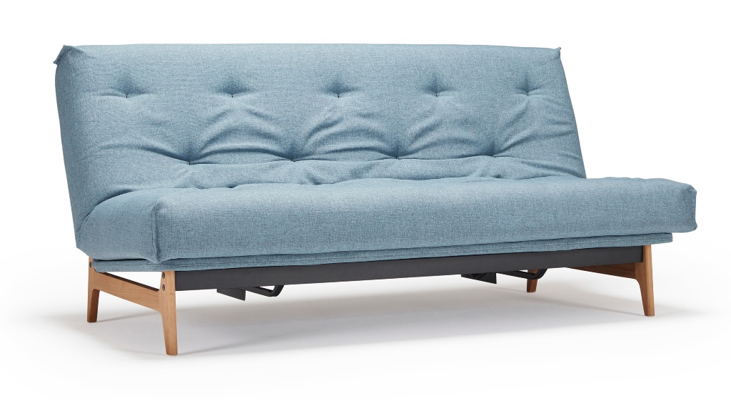 Aslak bäddsoffa 140, klädd i tyg 525 Mixed Dance Light Blue, som soffa