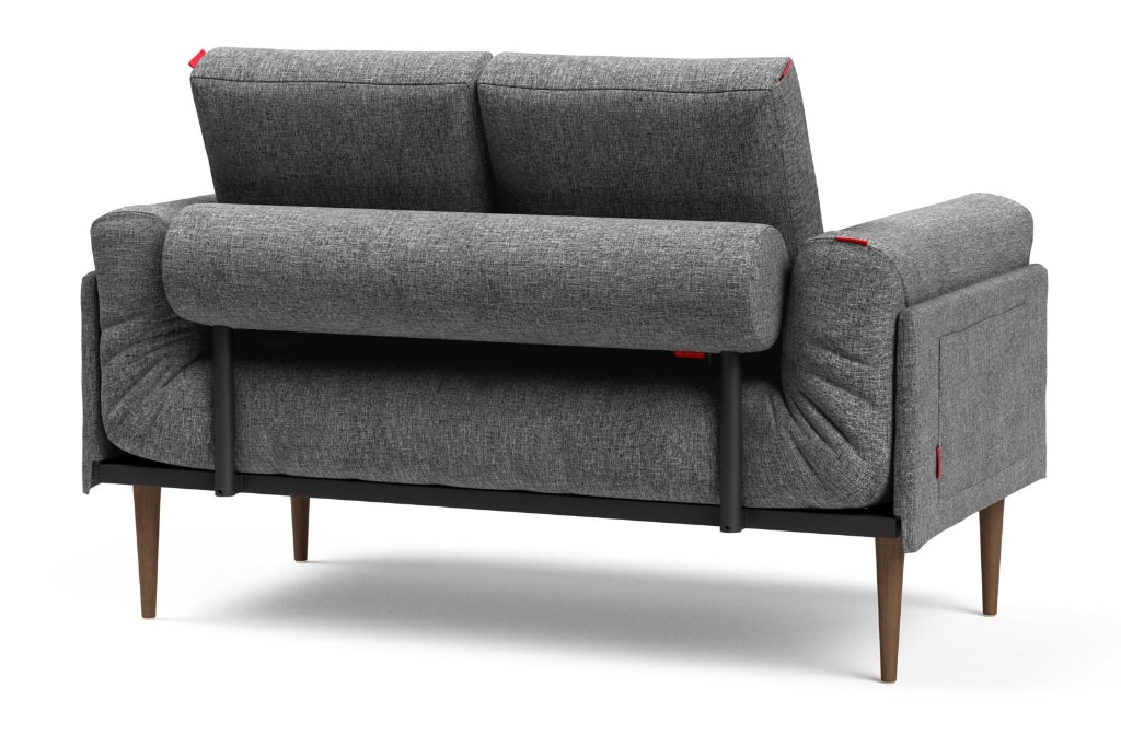 Rollo bäddsoffa med Styletto ben, klädd i tyg 563 Twist Charcoal, som soffa sedd bakifrån